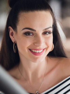 close-up-morning-portrait-of-smiling-pretty-woman-PB7VCWN.jpg