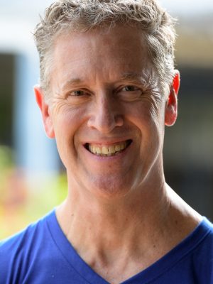face-of-happy-mature-man-smiling-in-the-streets-ou-E7W68G4.jpg