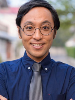 face-of-japanese-businessman-with-arms-crossed-out-3YW562D.jpg